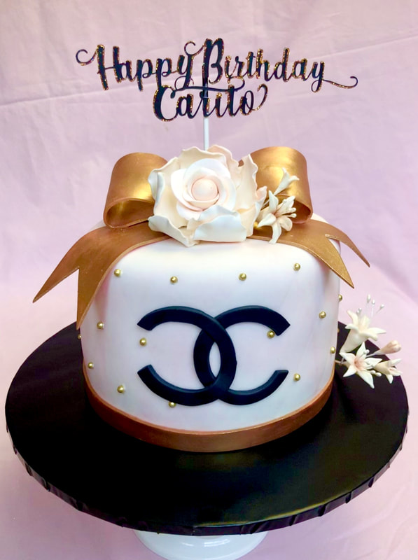 Chanel Birthday Cake with Gold bow, and gumpaste flowers