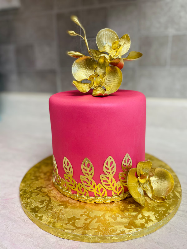 Picture of Magenta Fondant Cake with Gold Orchids and Edible Lace