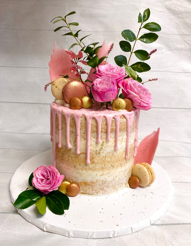 Picture of Naked Vanilla Cake with Pink Drip, Macarons and Pink Roses