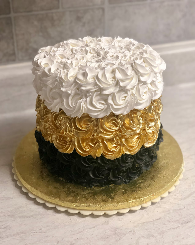 White, Gold and Black Rosette Cake