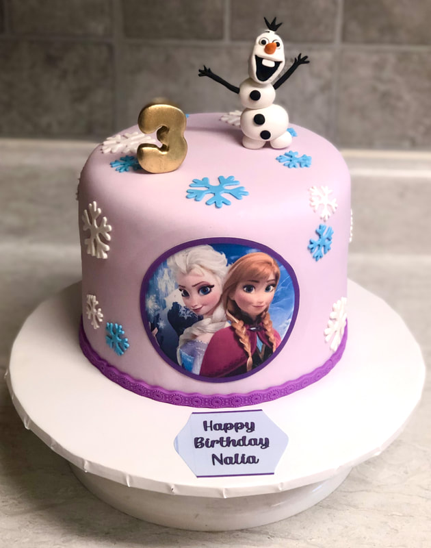 Pink FROZEN Cake with Olaf doll