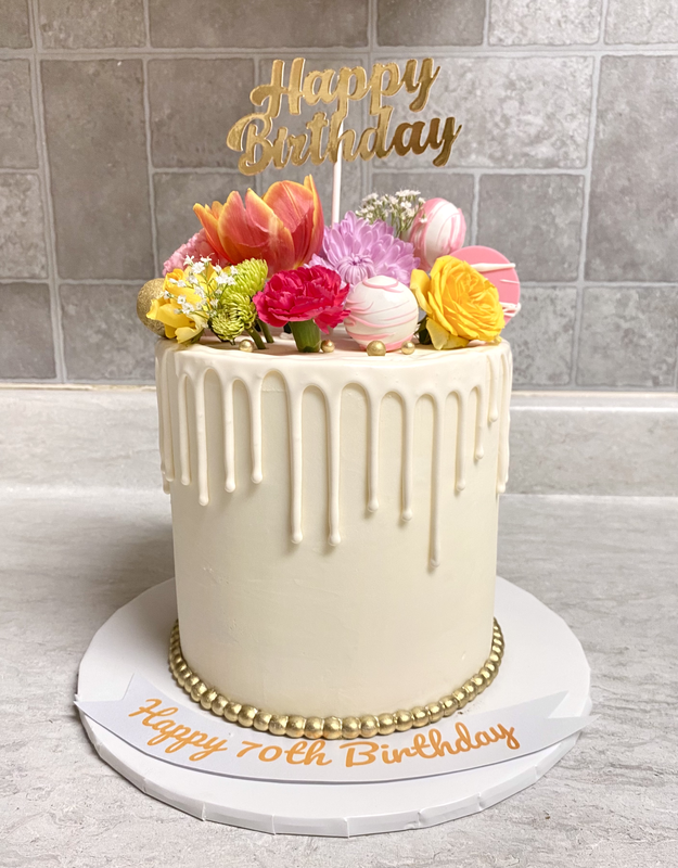 White Buttercream Drip Cake with Natural Flowers
