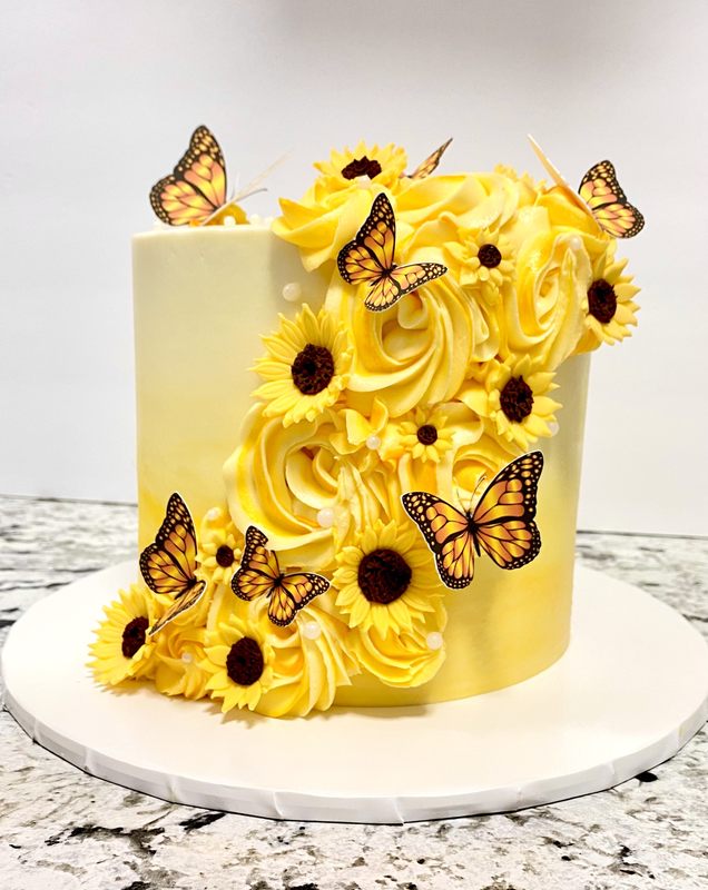 Picture of Yellow Frosted Cake with Sunflowers and Butterflies